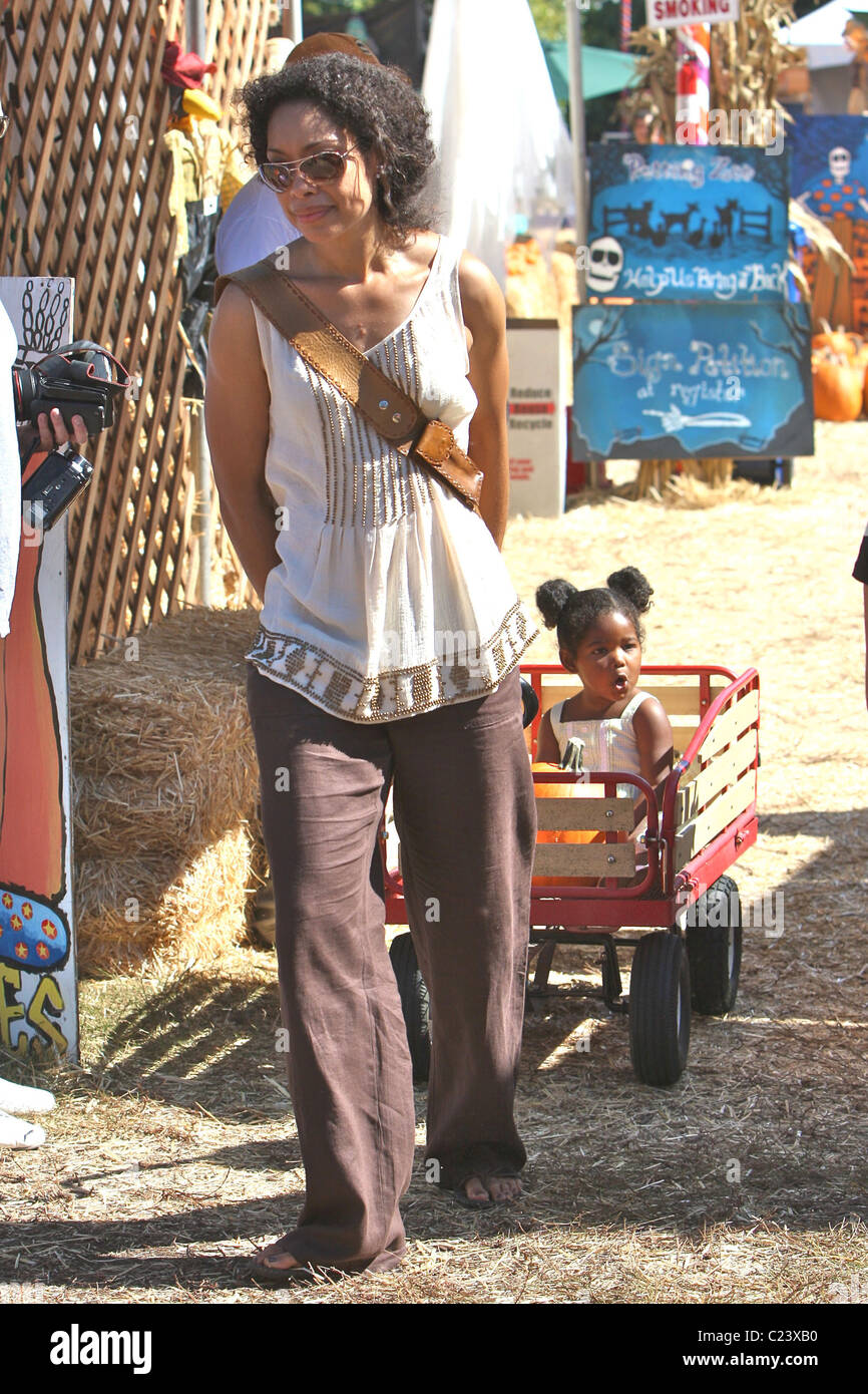 Gina Torres and daughter Delilah Fishburne visit Mr. Bones Pumpkin