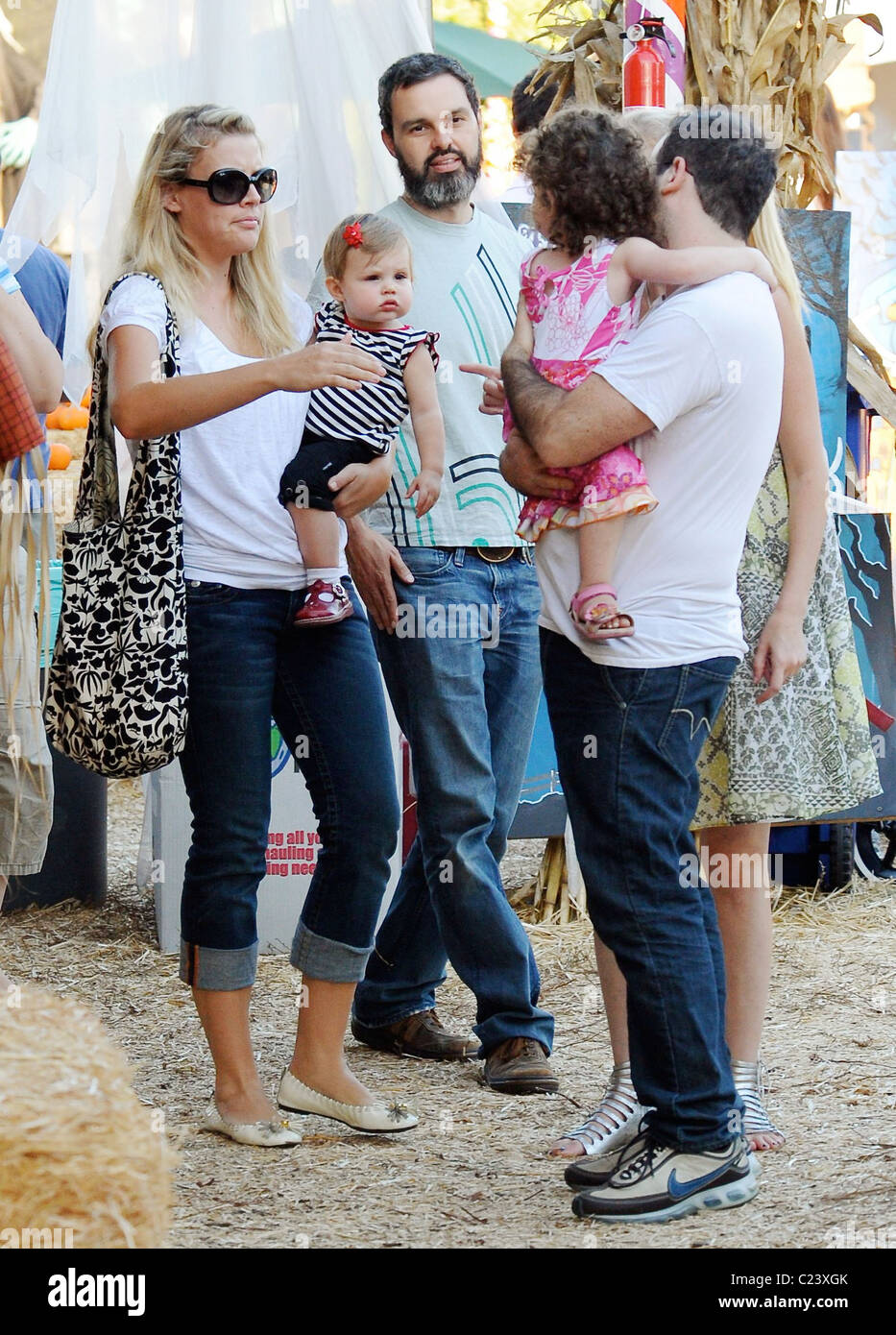 Busy Phillips and husband Marc Silverstein with their daughter Birdie