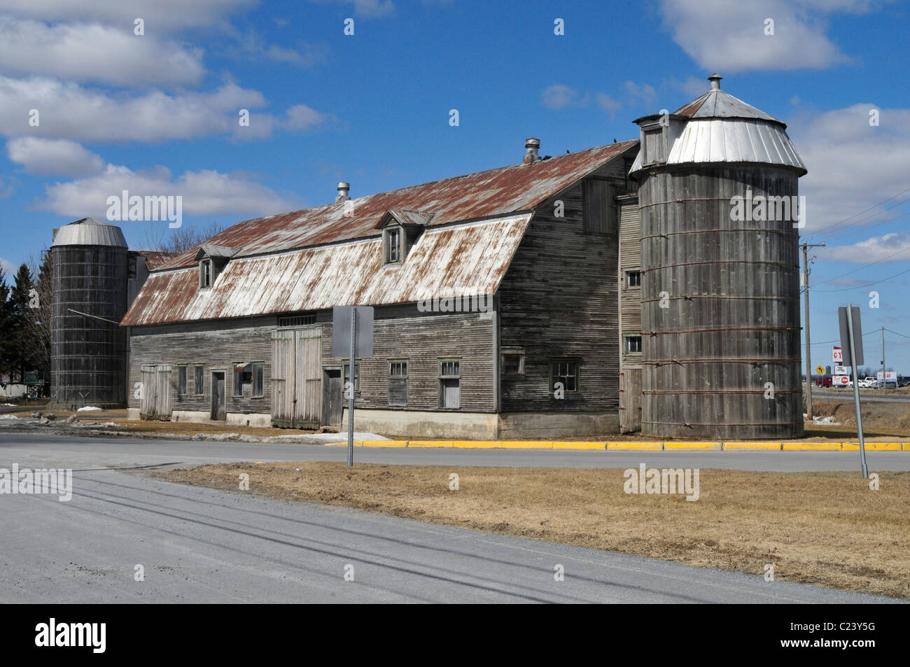 Abandoned grain/ farm house with silo in Quebec, Canada. Stock Photo