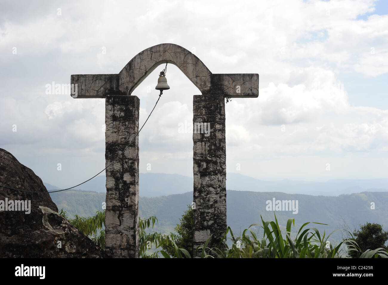 Buddist bell in front of mountains. Sri Lanka Stock Photo