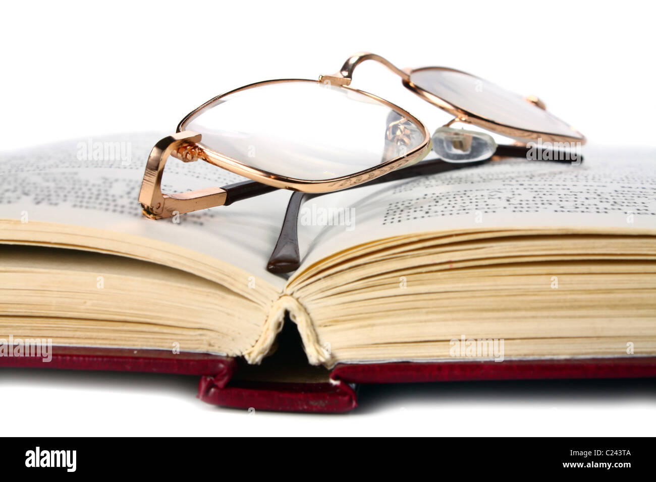 book and glasses isolated on white background Stock Photo - Alamy