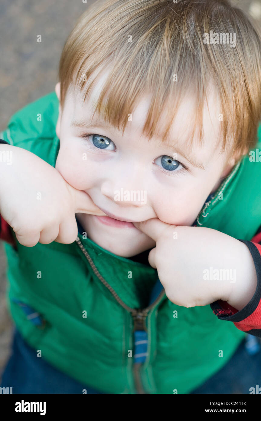 Blond blue-eyed boy aged 2-3 years cheeky, portrait Stock Photo