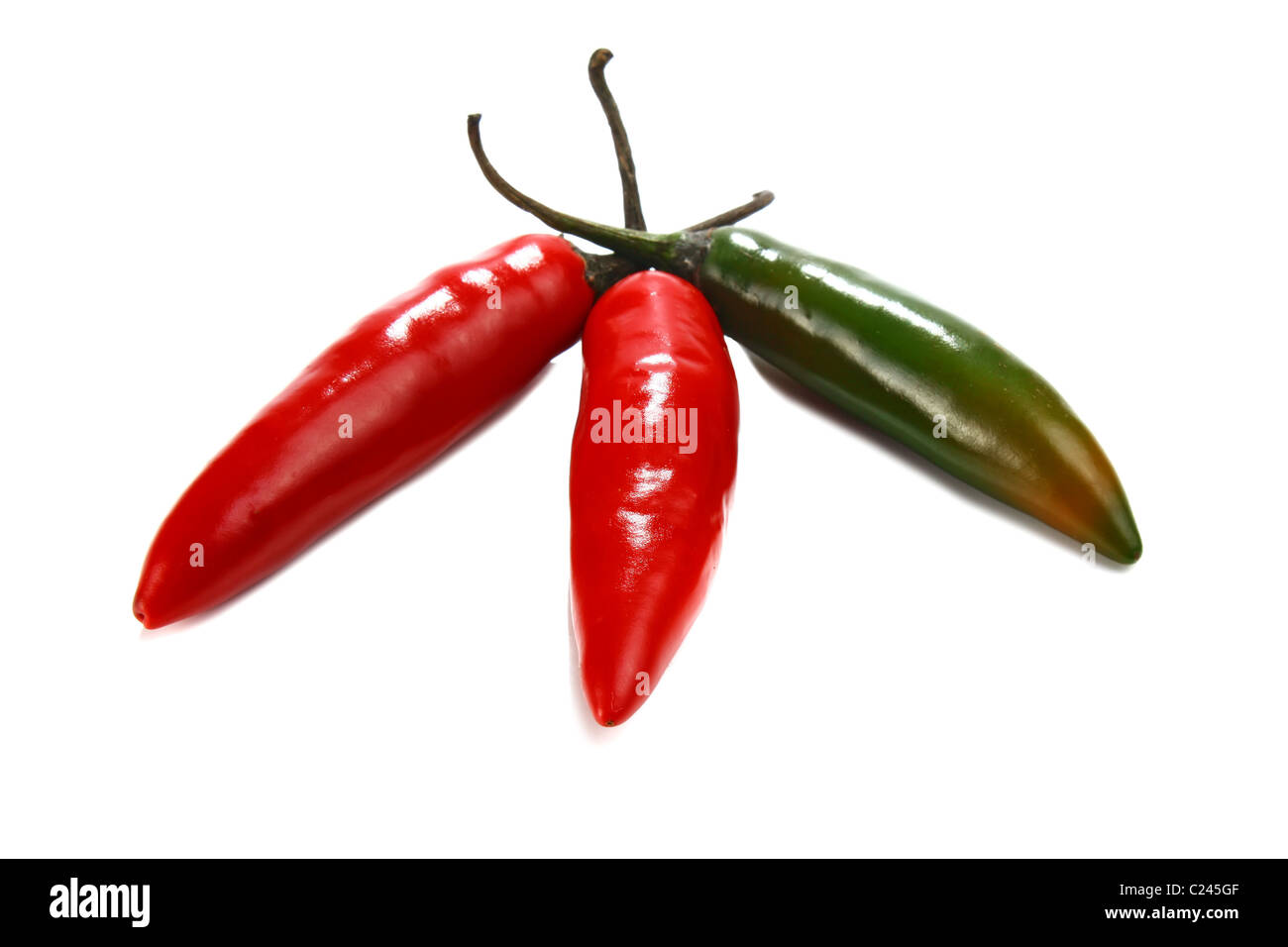 red hot chili peppers isolated on white background Stock Photo - Alamy