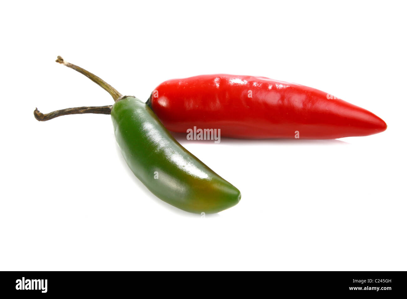 red hot chili peppers isolated on white background Stock Photo - Alamy