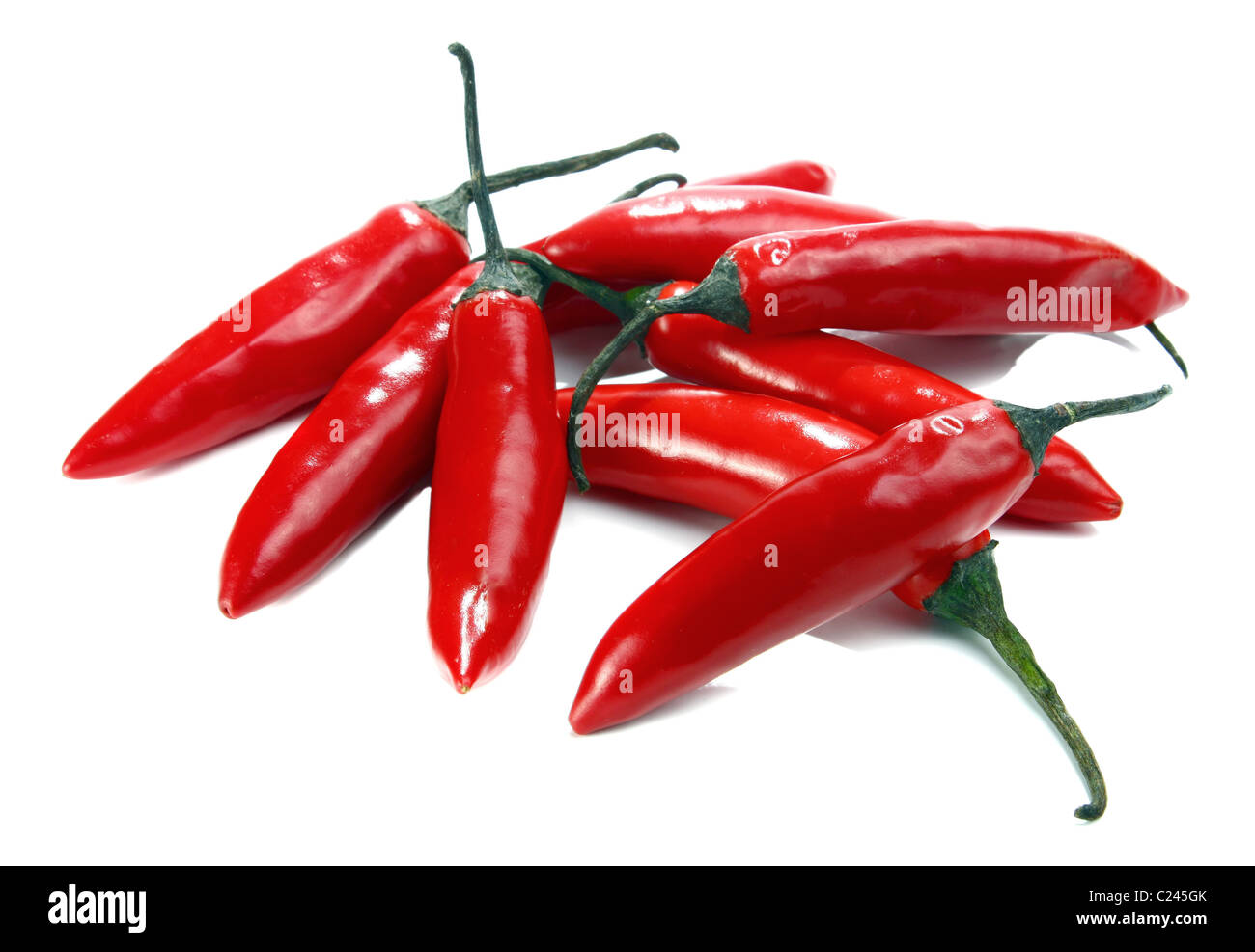 red hot chili peppers isolated on white background Stock Photo - Alamy