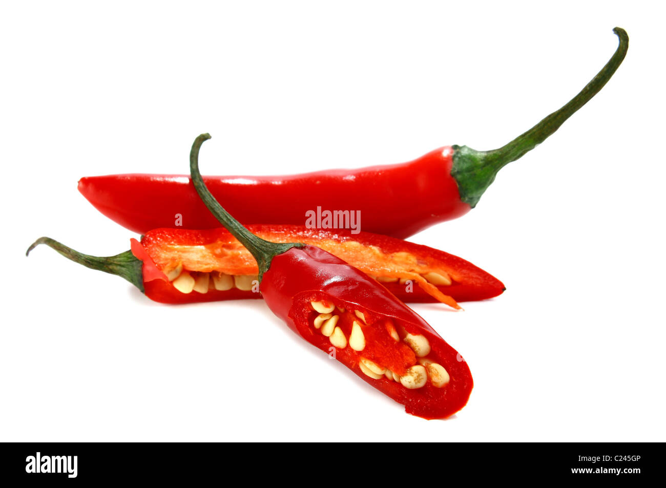 red hot chili peppers isolated on white background Stock Photo - Alamy