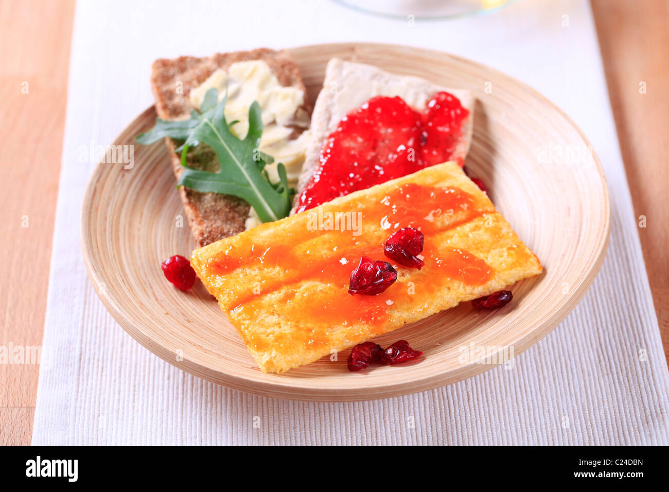 Various kinds of crispbread and jam - still life Stock Photo