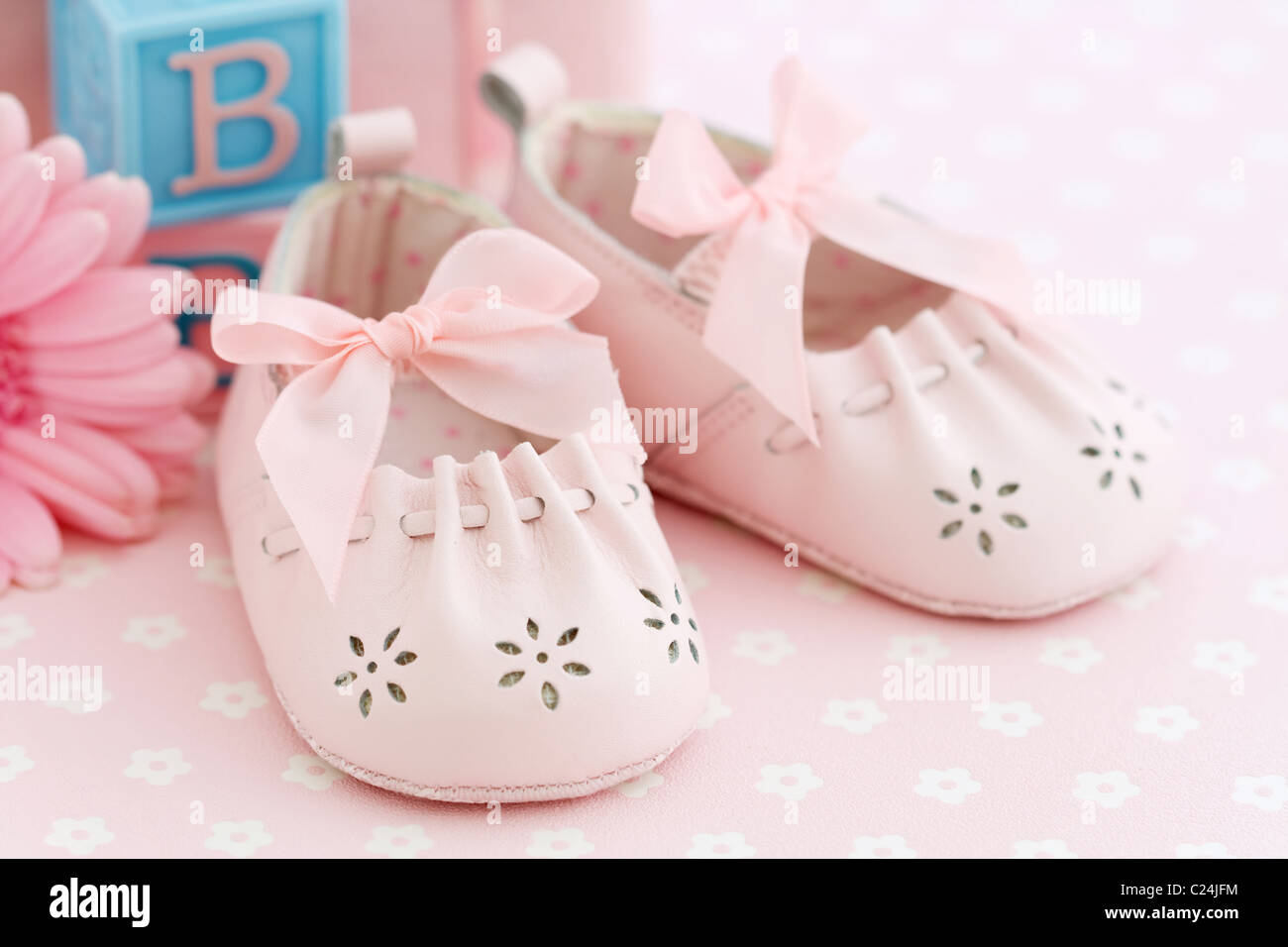 Pink baby shoes Stock Photo