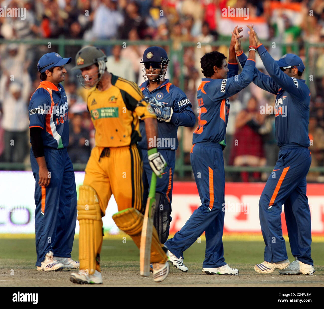 Indian Player Ravinder Jadeja celebrates with team member Rickey Ponting during the Australia vs India - 3rd ODI played at Stock Photo