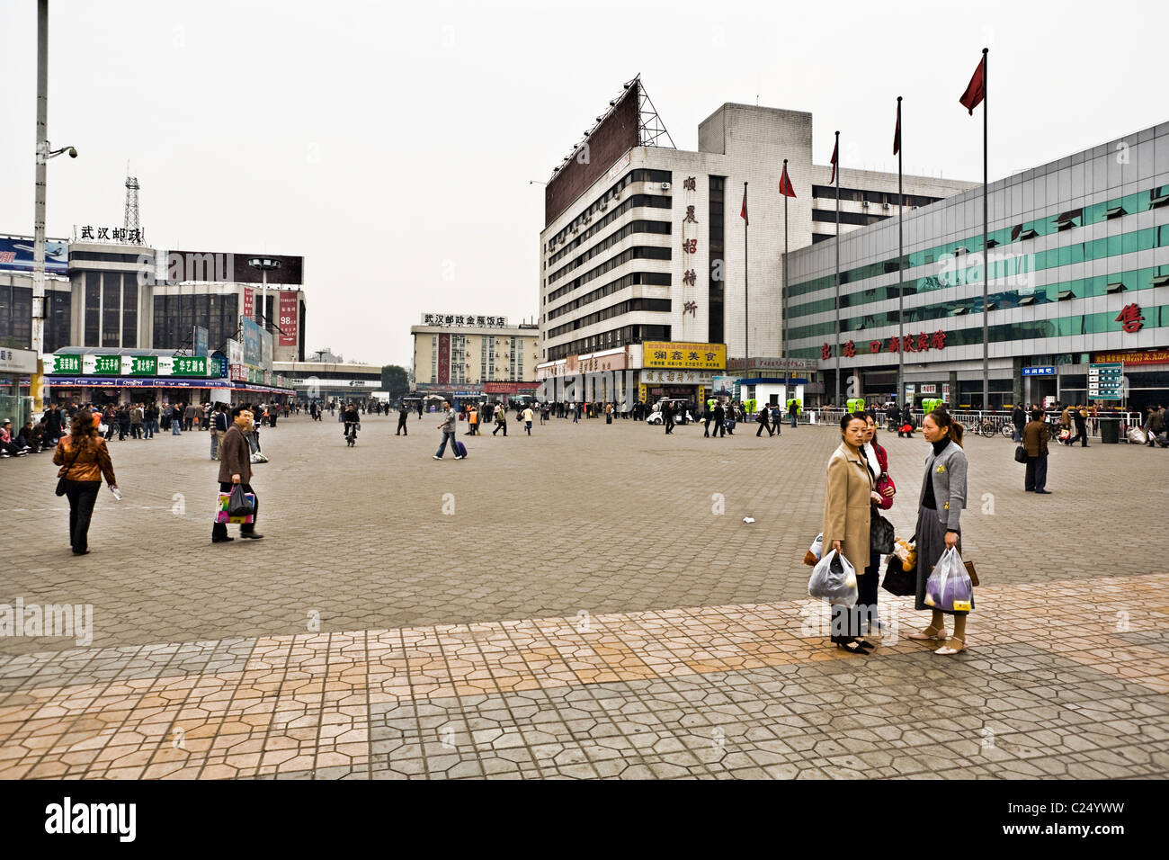 CHINA, WUHAN: Hankou Railway Station in Wuhan with plaza and people traveling to the train. Photo Illustration. Stock Photo