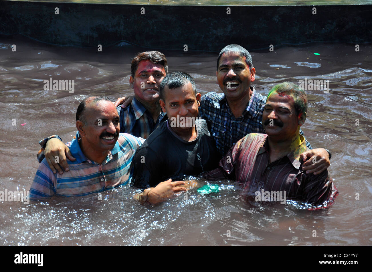 Holi celebration in water In India Stock Photo