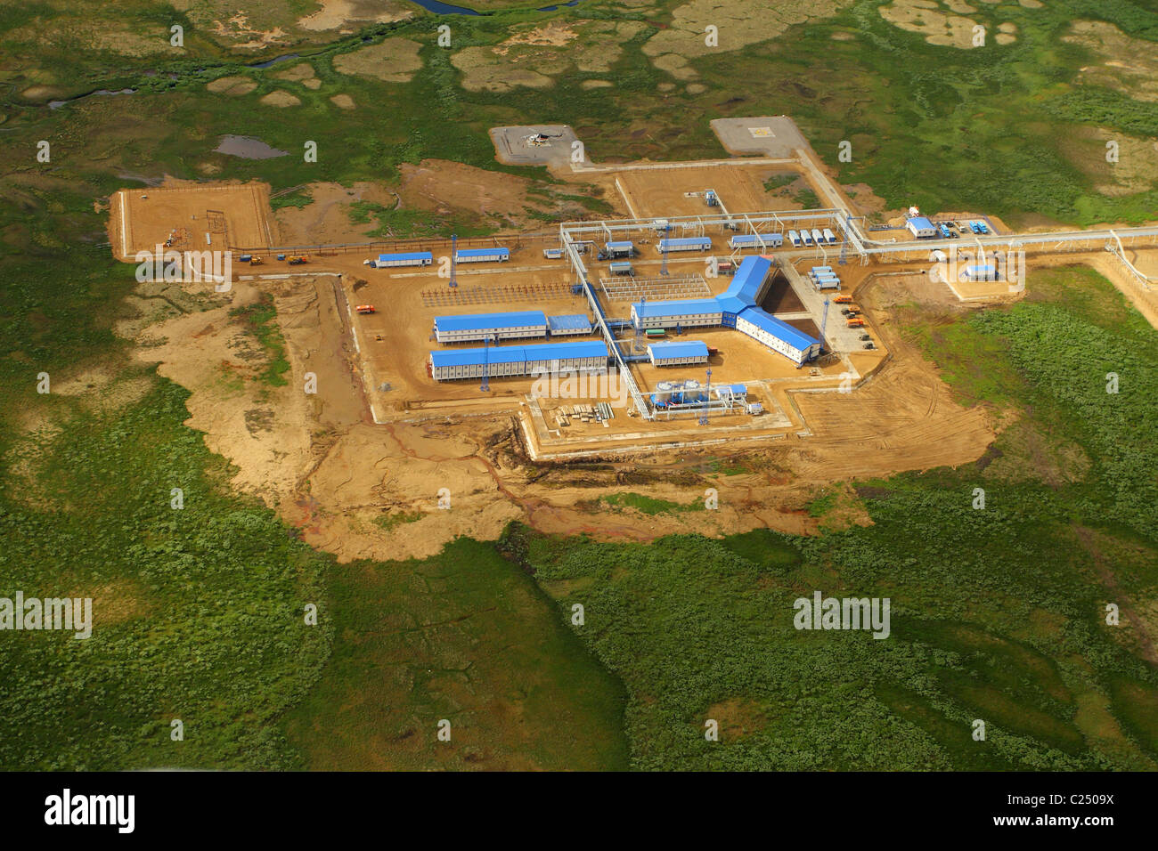 Workers' settlement in the tundra. One of the oil fields in Nenets Autonomous Okrug, RUSSIA, an aerial view in the summer. Stock Photo