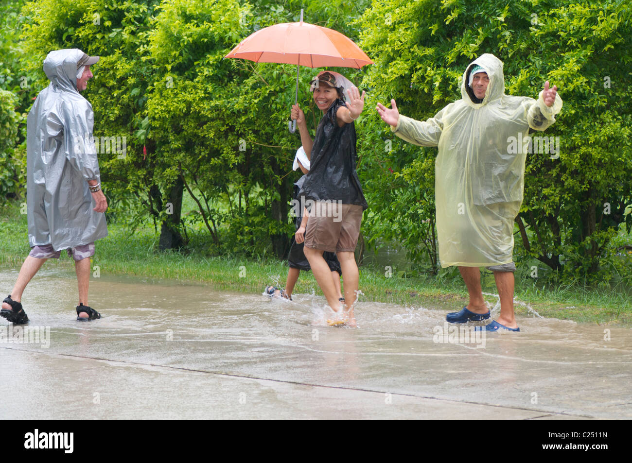 Family in the rain Stock Photo