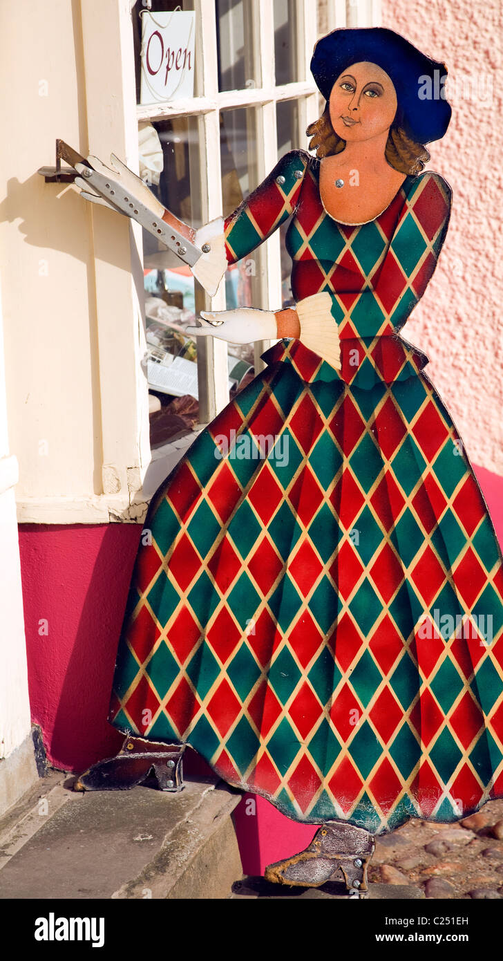 Wooden cut out woman classical clothing shop entrance Woodbridge