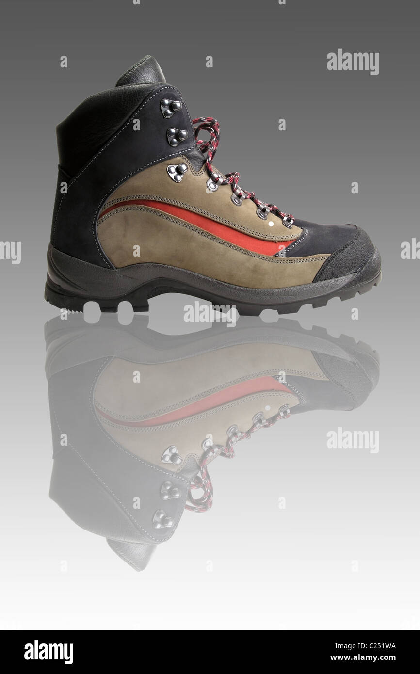 Fashion hiking boots isolated on light background Stock Photo
