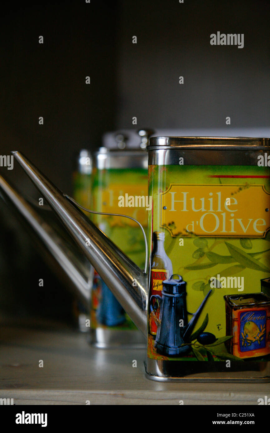 Olive oil cans at the Moulin de l'Olivette shop, Manosque, Provence, France. Stock Photo