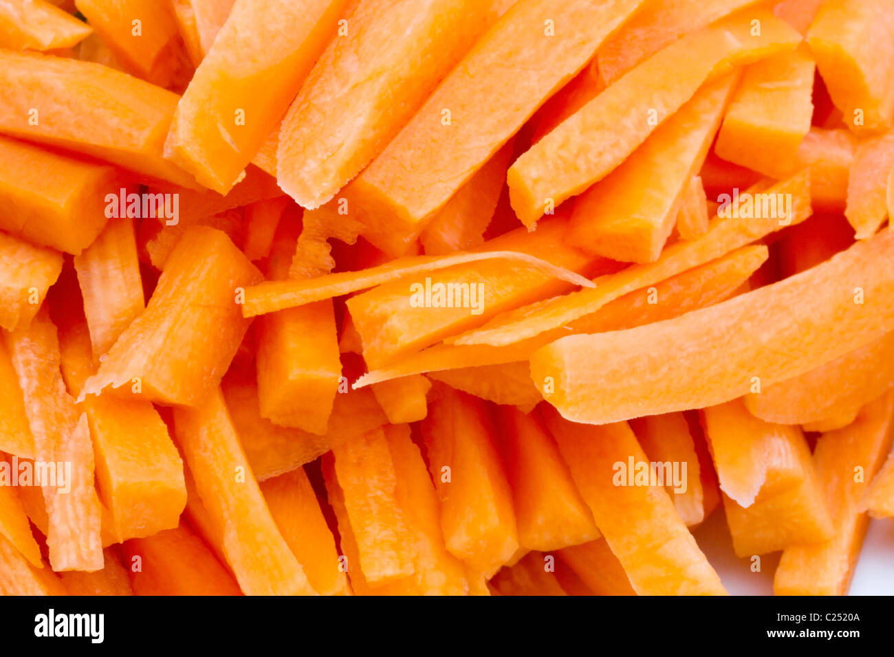 Background of fresh sliced carrot closeup Stock Photo