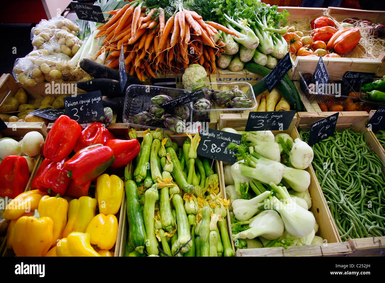 Vegetables stall at the Cours Massena market in the old town, Antibes, Alpes Maritimes, Provence, France. Stock Photo
