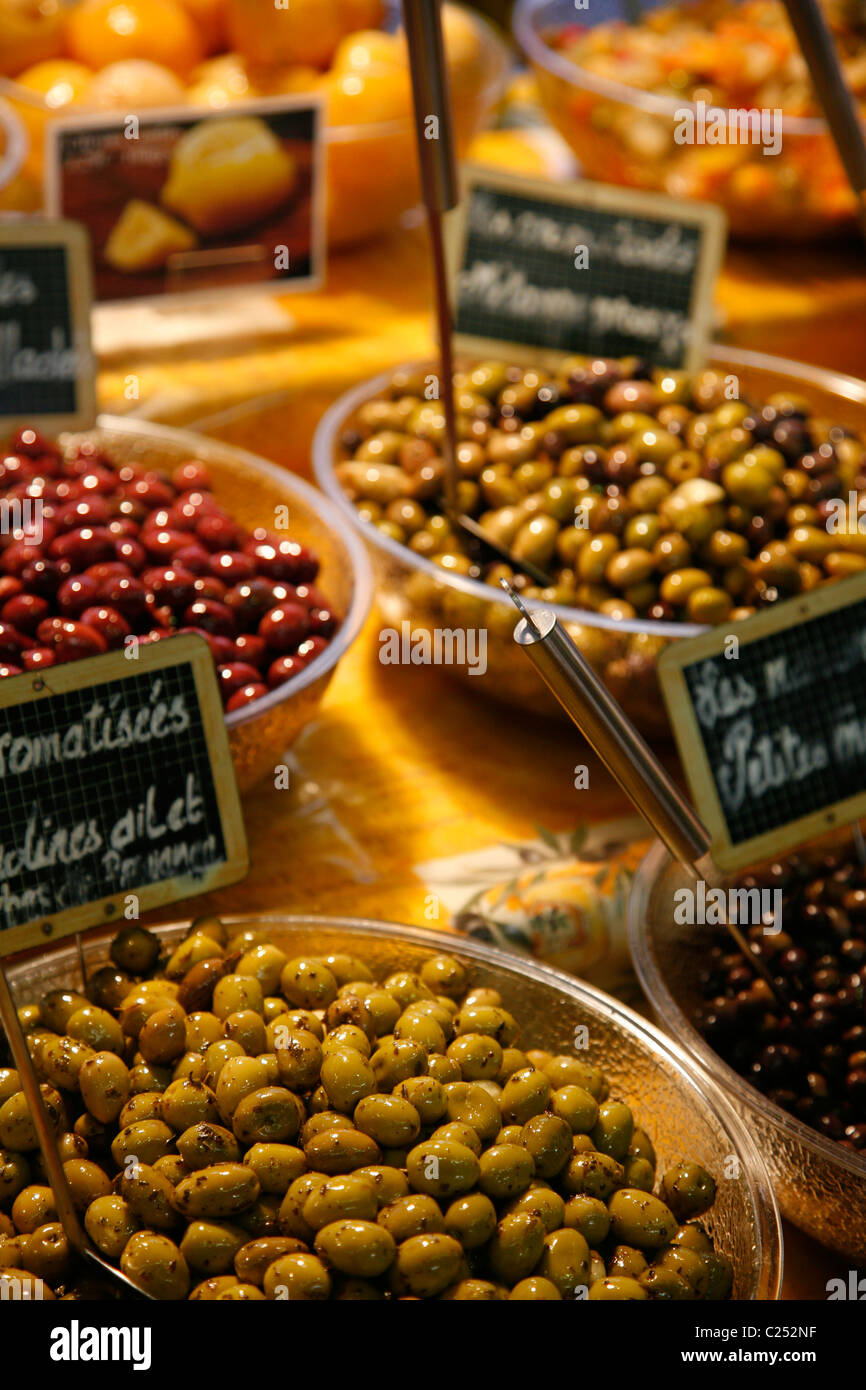 Stall selling olives at the Cours Massena market in the old town, Antibes, Alpes Maritimes, Provence, France. Stock Photo