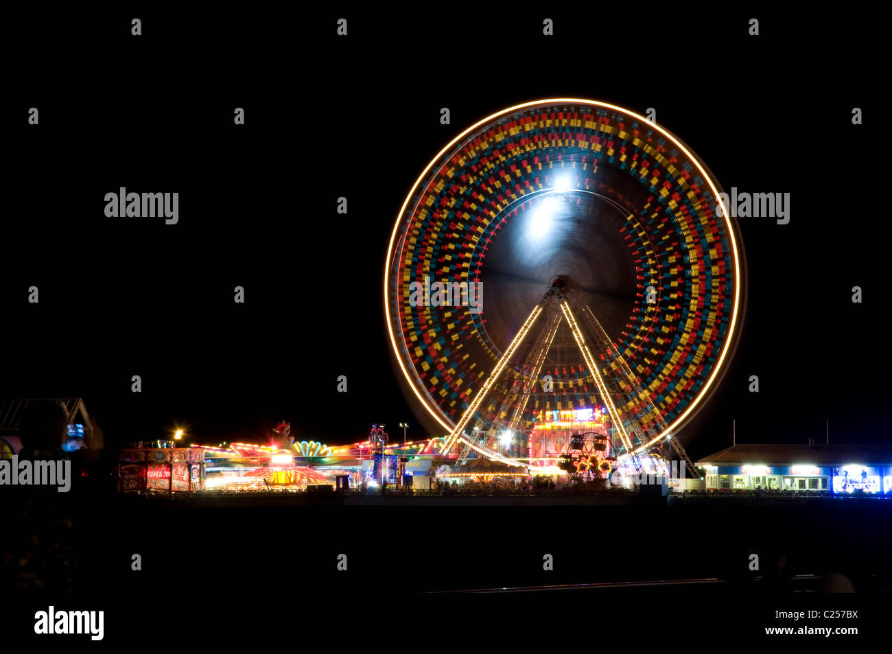 Big wheel on the Centre (Tower) Pier at Blackpool, Northwest England, photographed at night. Stock Photo
