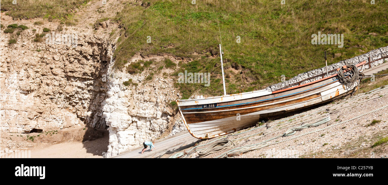 Fishing boats on the beach at North Landing, Flamborough, East Yorkshire Stock Photo