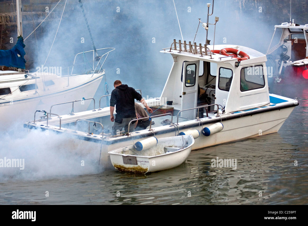 Boat with smoking engine in Lynmouth Harbour Stock Photo Alamy