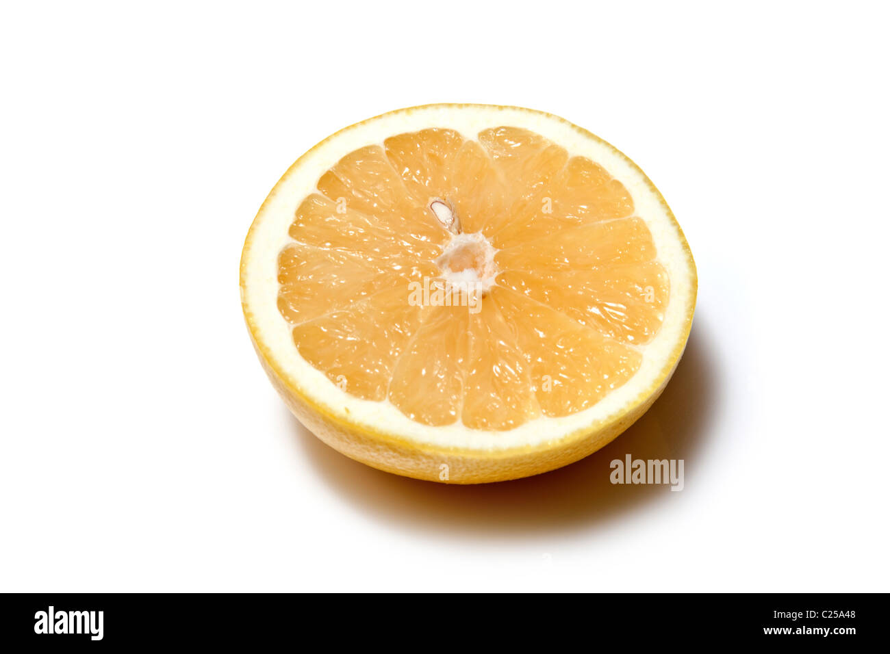 Grapefruit halved isolated on a white studio background. Stock Photo