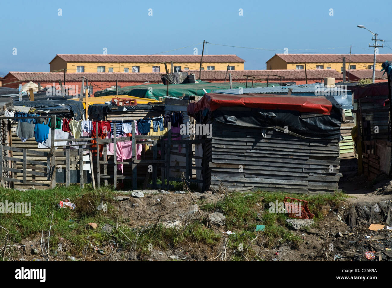 Shacks and new housing along Vanguard Drive, Epping, Cape Town, South