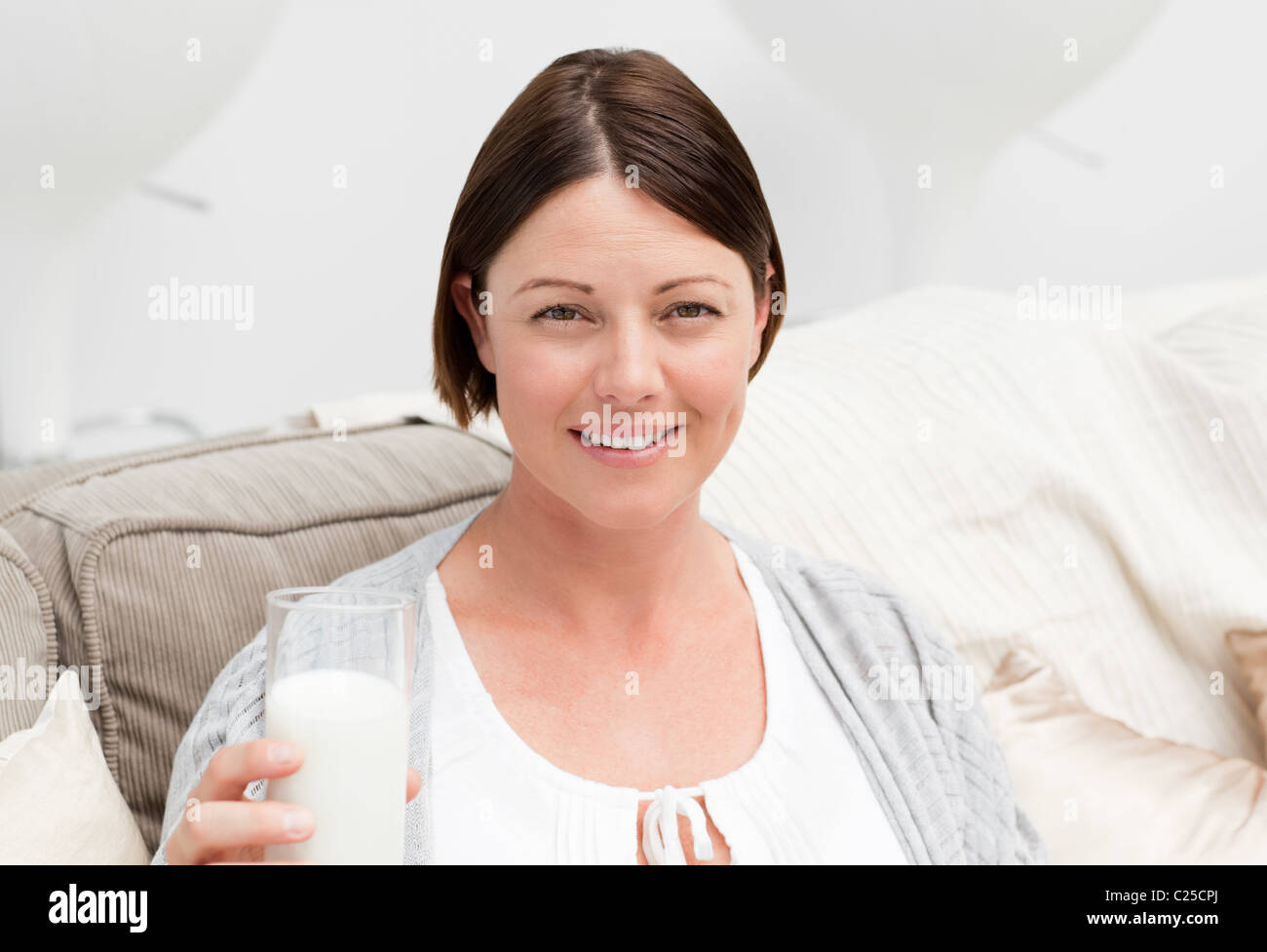 Pregnant woman drinking milk Stock Photo Alamy