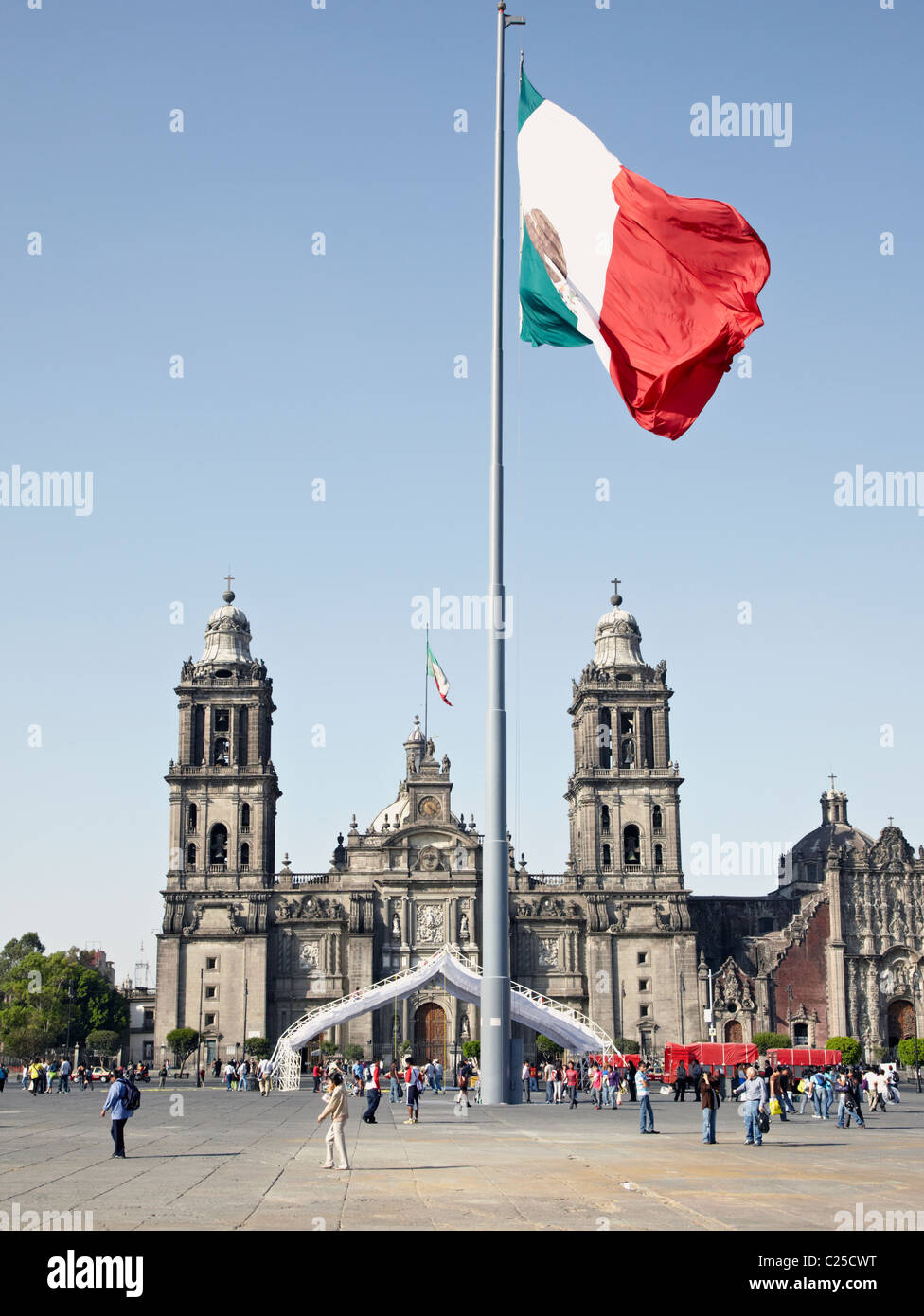Mexican Flag and Cathedral Metropolitana In Zocalo Mexico City Stock Photo