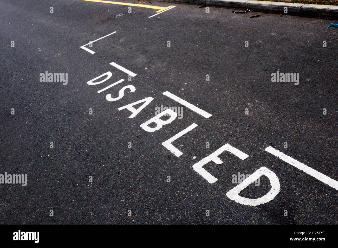 A disabled parking space. See C25F11 for right-facing. Stock Photo