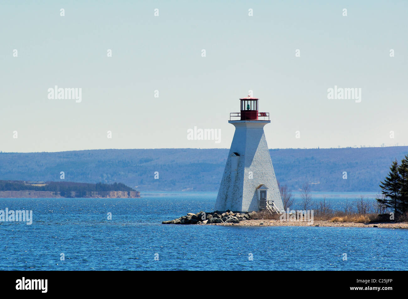 Lighthouse on Peninsula Stock Photo