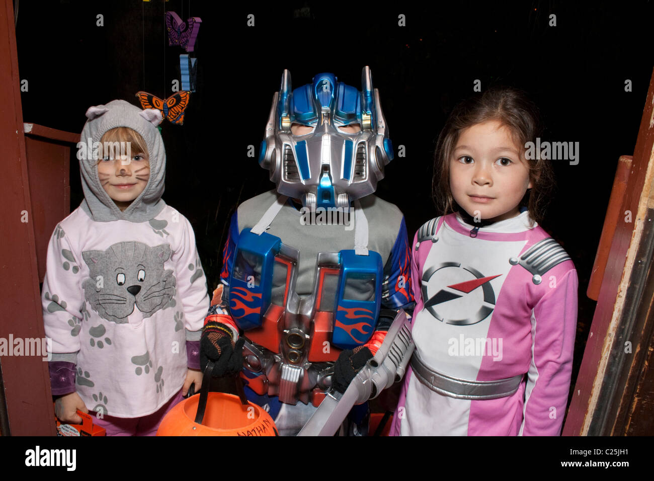 Outer space Halloween tricks or treaters. St Paul Minnesota MN USA Stock Photo