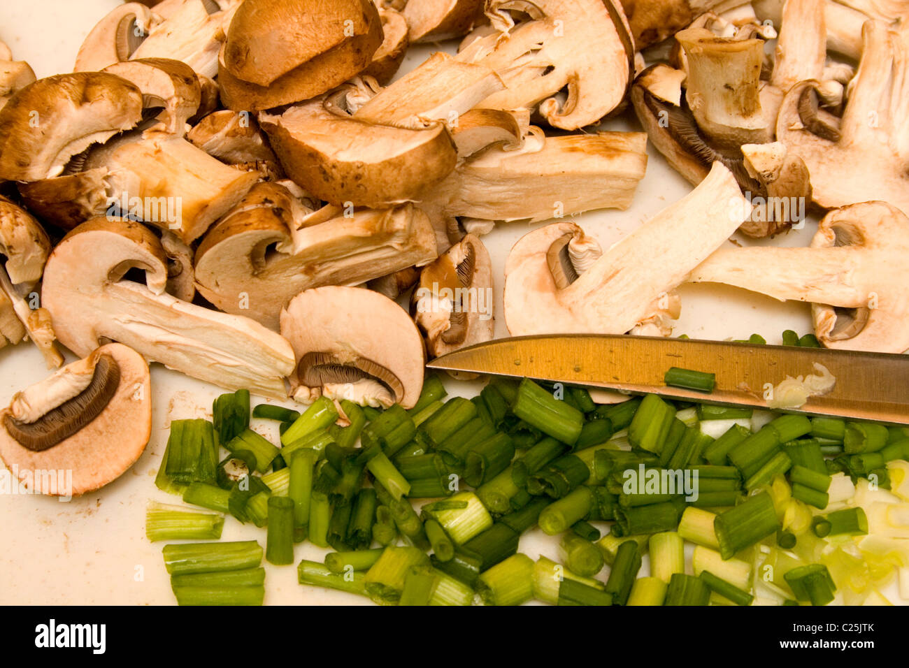Chopped scallions and sliced mushrooms prepared for a nutritious