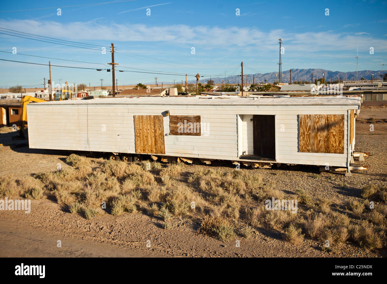Remains of a trailer home Salt along the coast of the Salton Sea at sunrise Imperial Valley, CA. Stock Photo