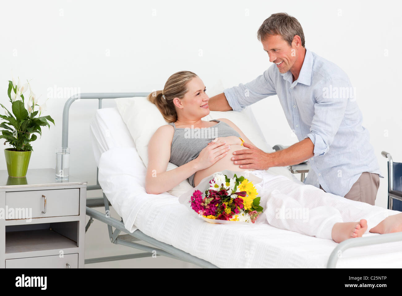 Adorable couple in a hospital room Stock Photo Alamy