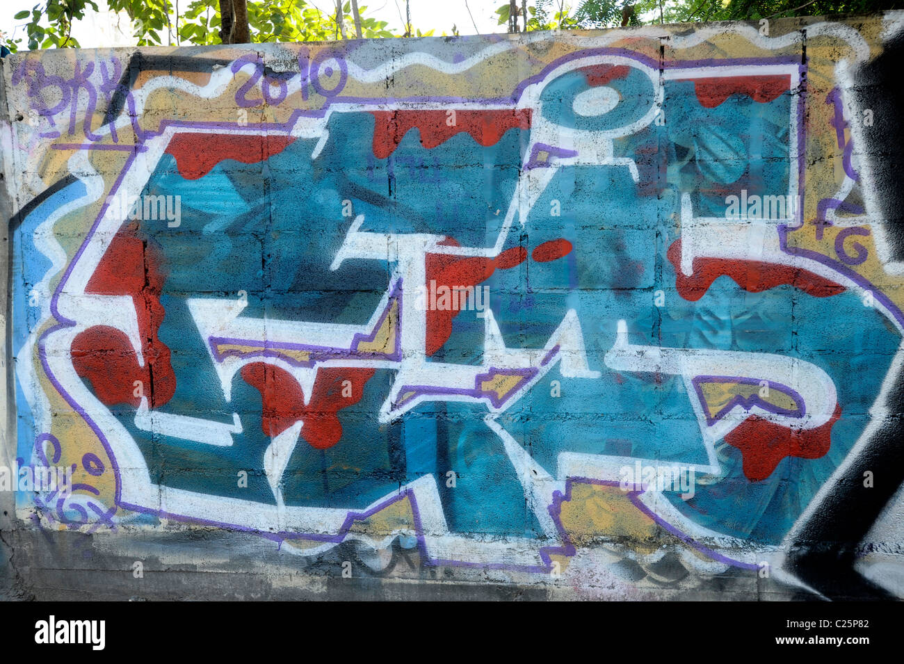 graffiti on the wall, expressionism and social messaging, weird and bizarre art, bangkok, thailand Stock Photo