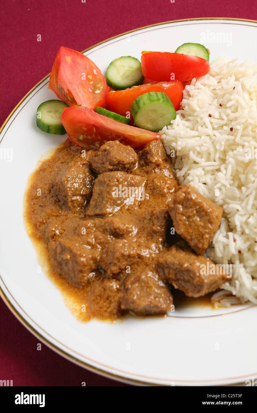 North Indianstyle beef korma curry with basmati rice and a salad of