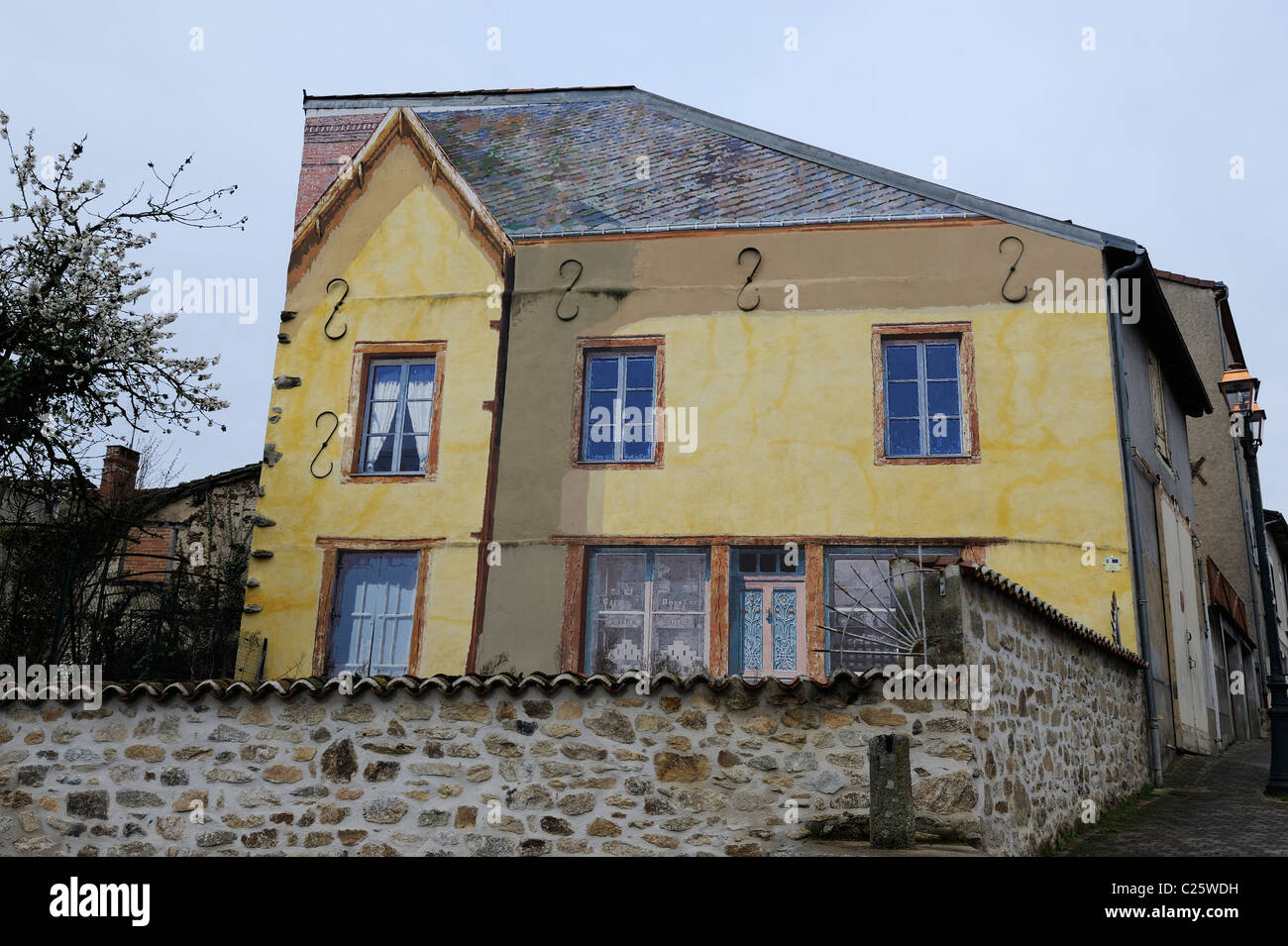 house with a mural painted on the side Stock Photo Alamy
