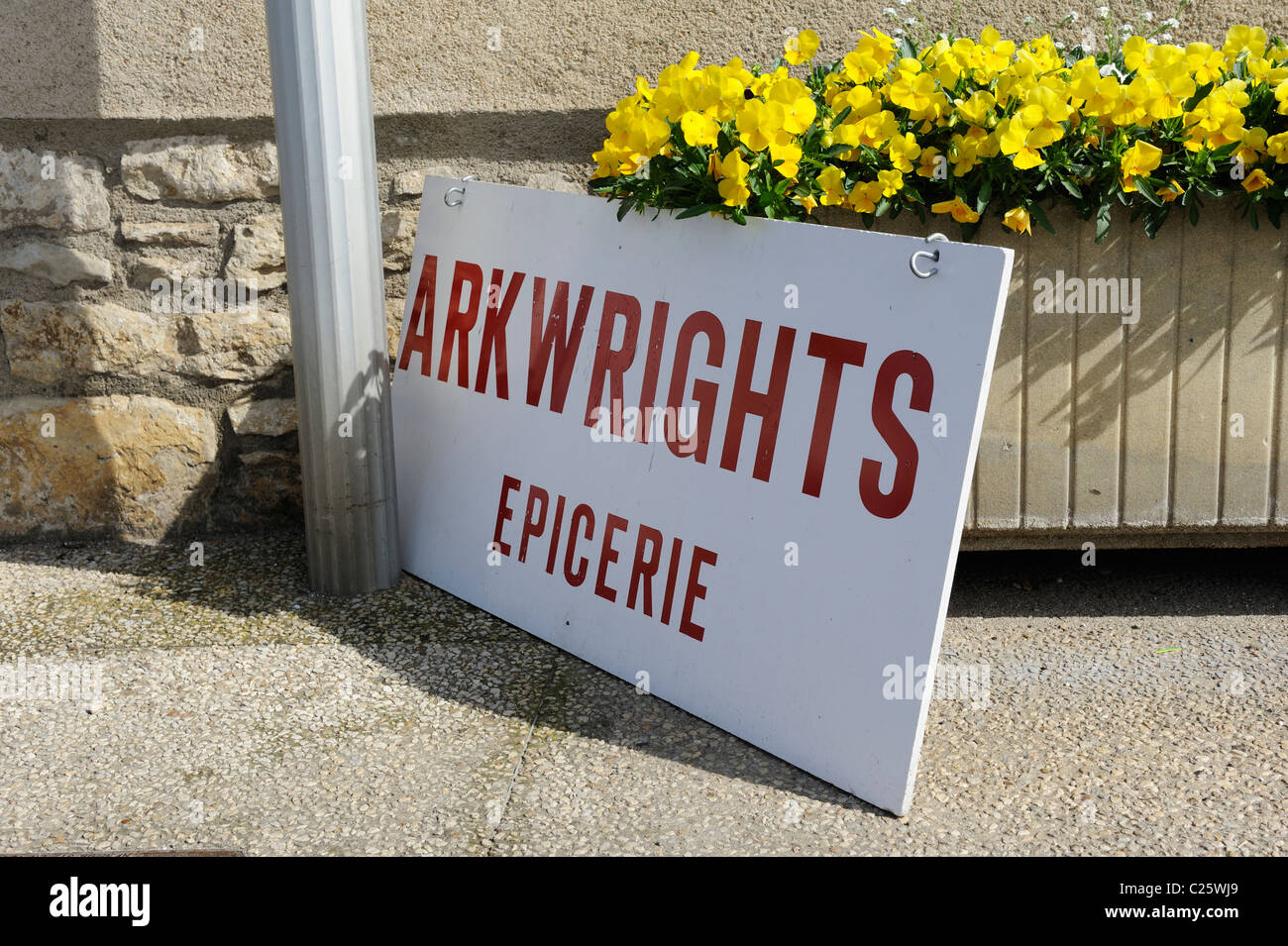 Stock photo of a typically English name on a French shop sign for the local Epicerie. Stock Photo