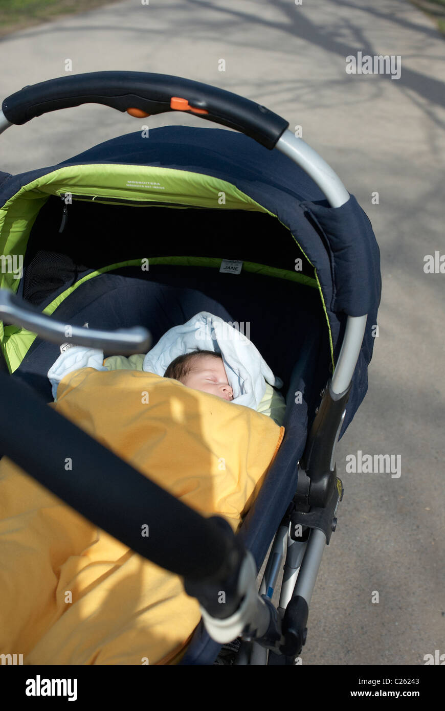 Baby girl in a pram Stock Photo Alamy