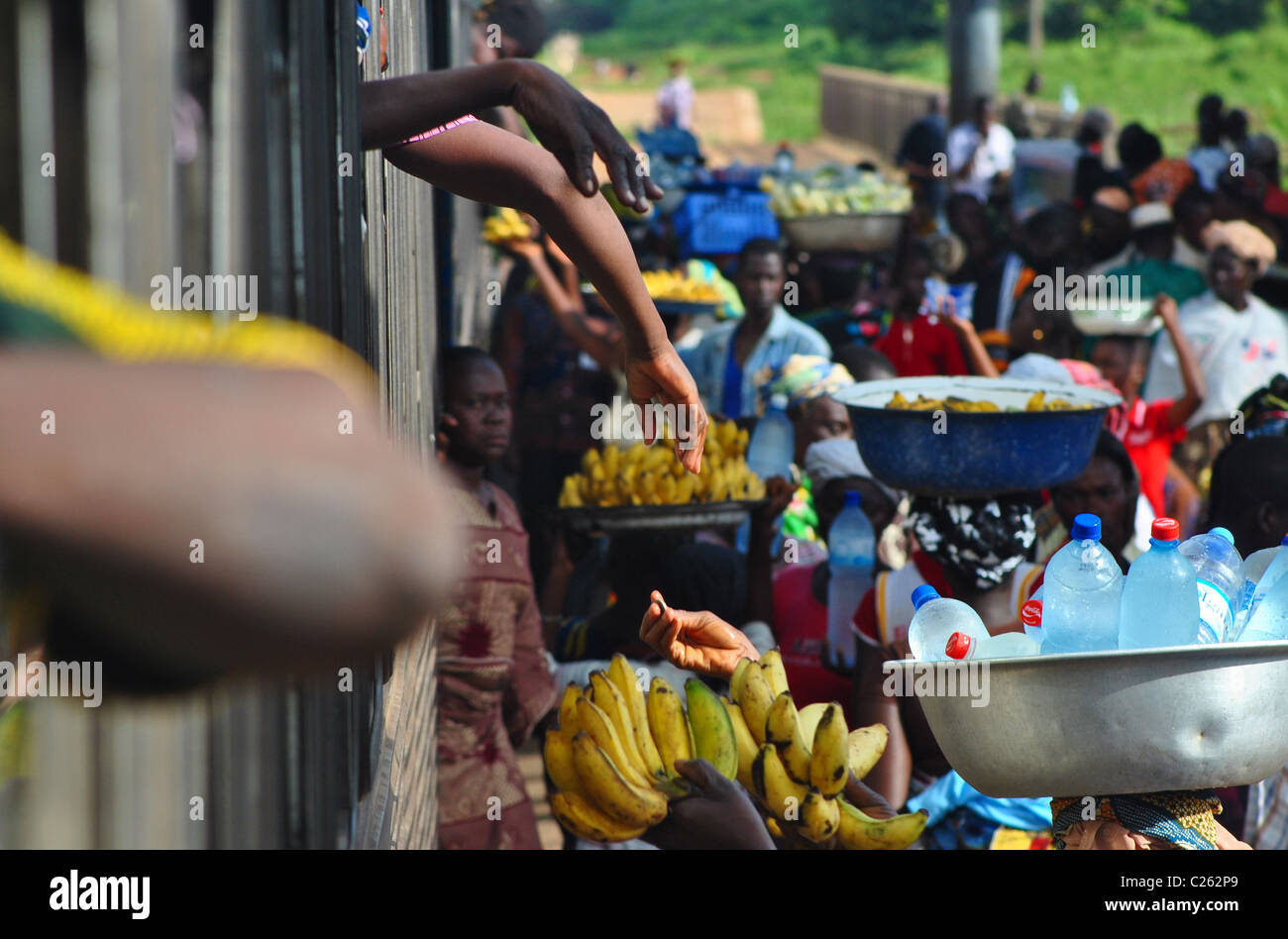 Bustling railway platform in Ivory Coast, on the line from Abidjan to Burkina Faso Stock Photo