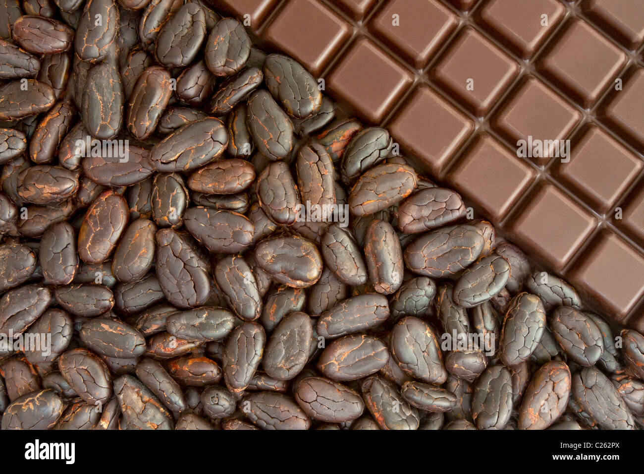 Bar of chocolate, and cocoa beans Stock Photo
