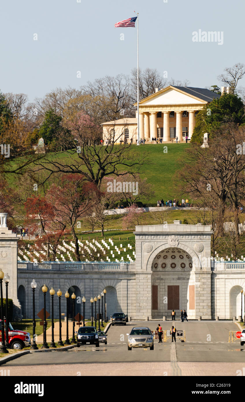 Arlington House, also known as the Robert E. Lee Memorial on top of the  hill of Arlington National Cemetery. The shot is taken from Memorial Bridge  looking west. In the foreground is