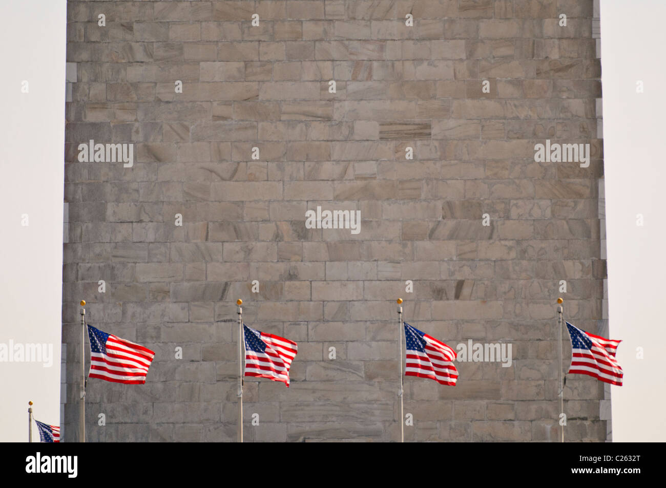 WASHINGTON DC, USA - American flags against the side of the Washington Monument on the National Mall Stock Photo