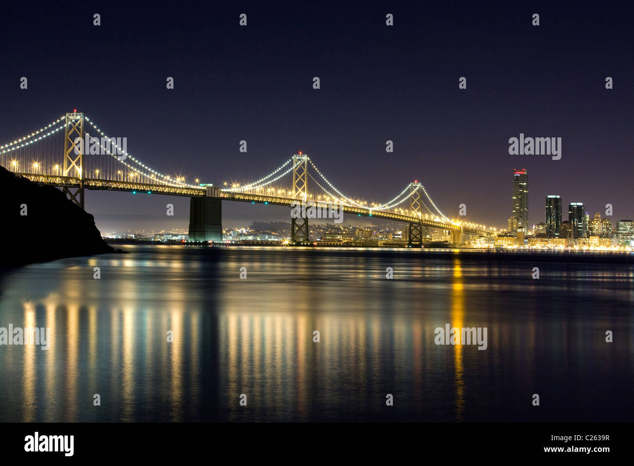 San Francisco's Bay Bridge at night - California USA Stock Photo