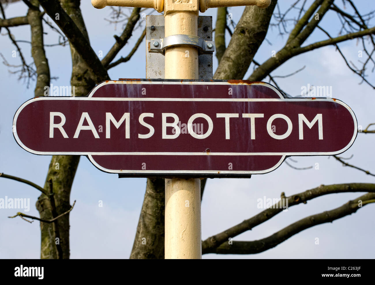 Station sign on the platform at Ramsbottom Railway Station on the East Lancs Railway Stock Photo
