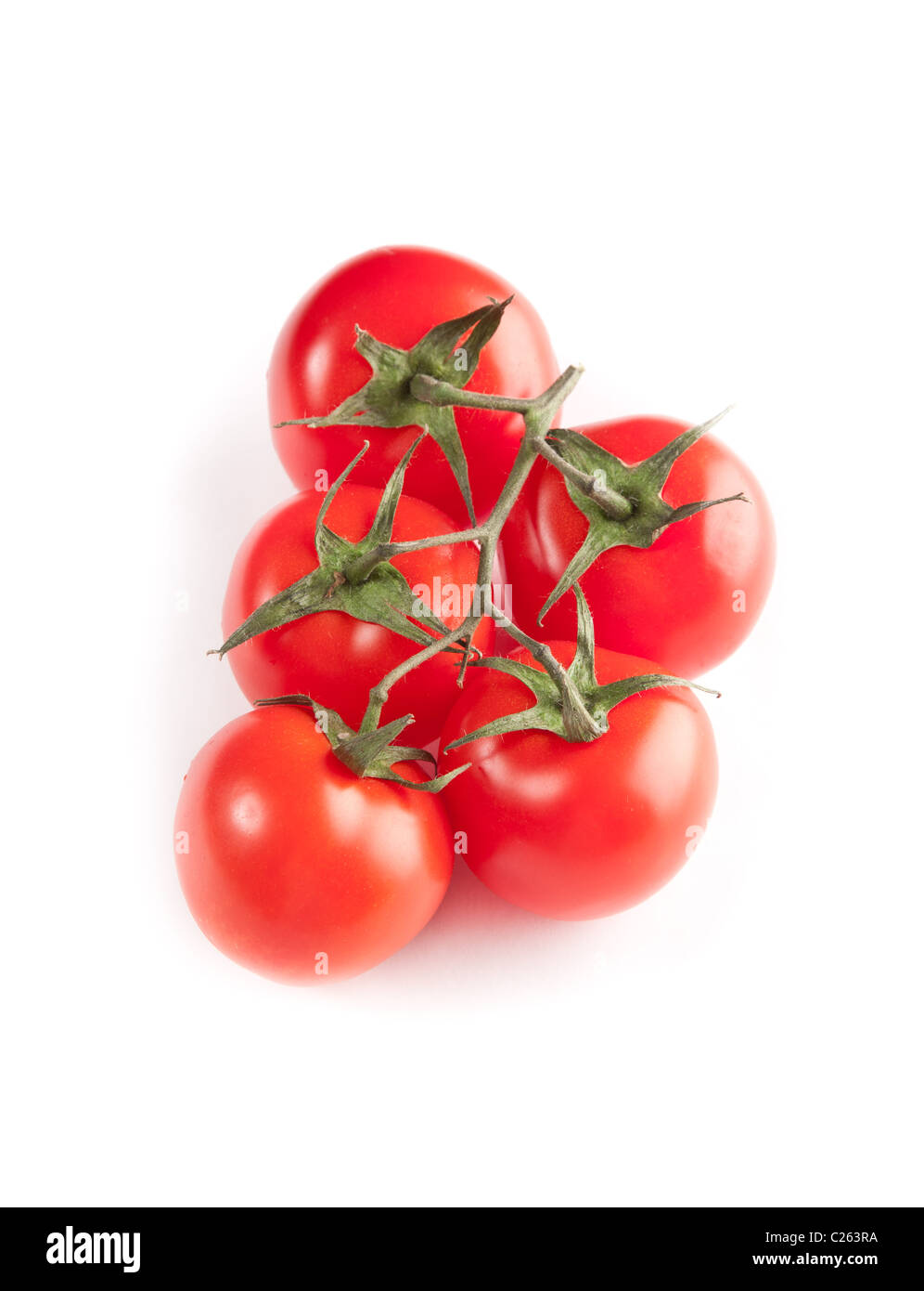 Picture of red tomatoes isolated on white Stock Photo - Alamy