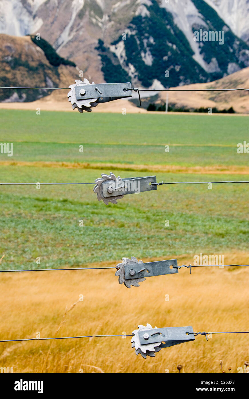 Wire fence tensioners in New Zealand's Canterbury High Country Stock Photo