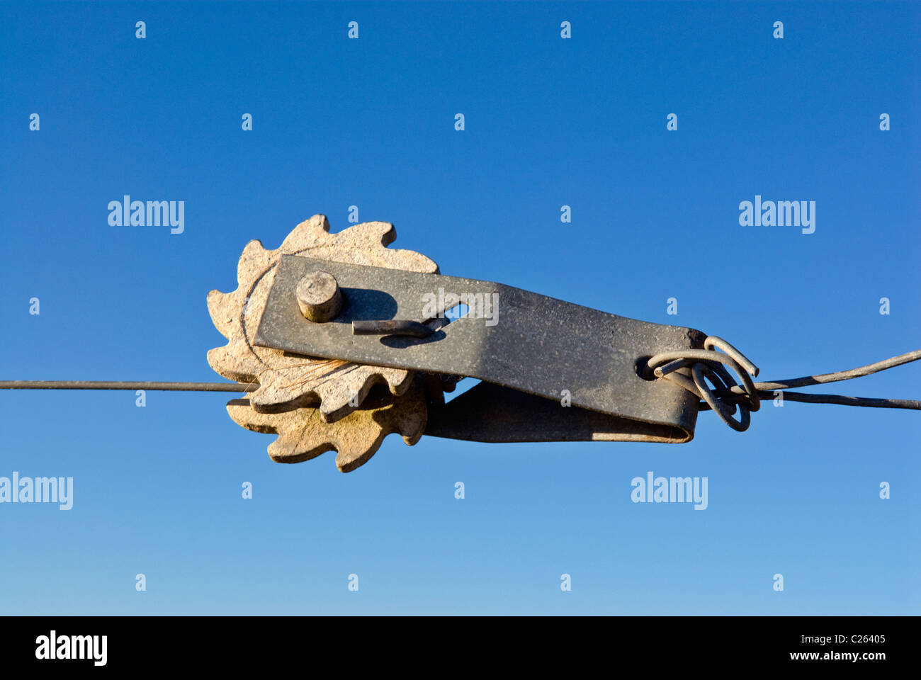 A rotary fence wire tensioner Stock Photo
